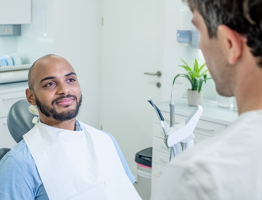 A patient talking to his dentist