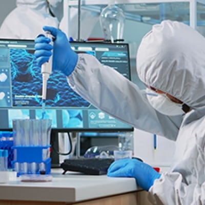 Lab technician working in a lab