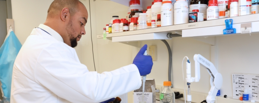 Lab technician working in a lab